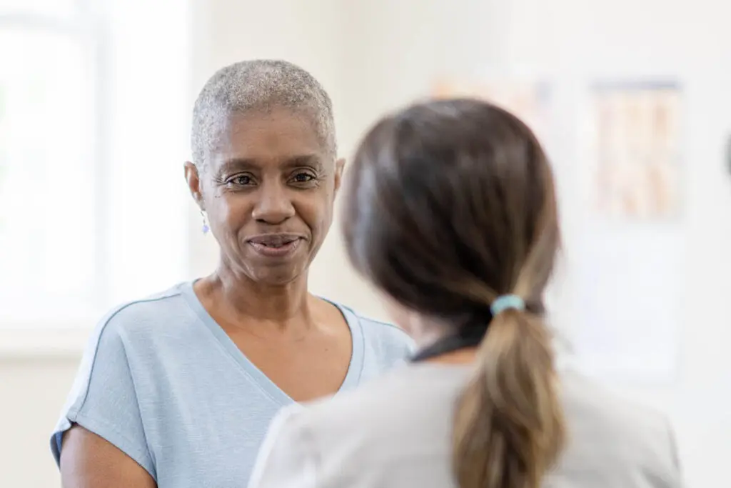 Patient speaking with her doctor